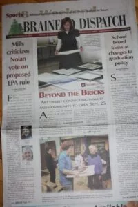 behind the bricks newspaper 001
